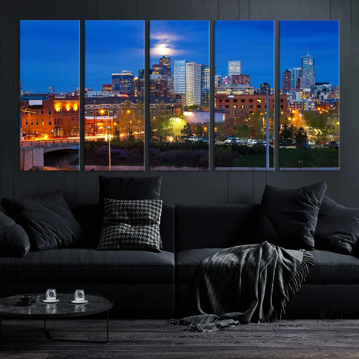 The Denver City Lights Night Blue Skyline Cityscape View Wall Art Canvas Print showcases a stunning night cityscape. Printed on museum-quality canvas with a UV-protective coating, this artwork comes ready to hang, adding an effortless touch of elegance.