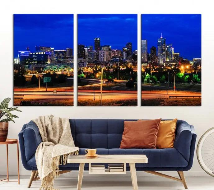 Display the exquisite Denver City Lights Night Bright Blue Skyline Cityscape View Wall Art Canvas Print. This museum-quality triptych canvas, delivered ready to hang with free shipping, effortlessly transforms your space.