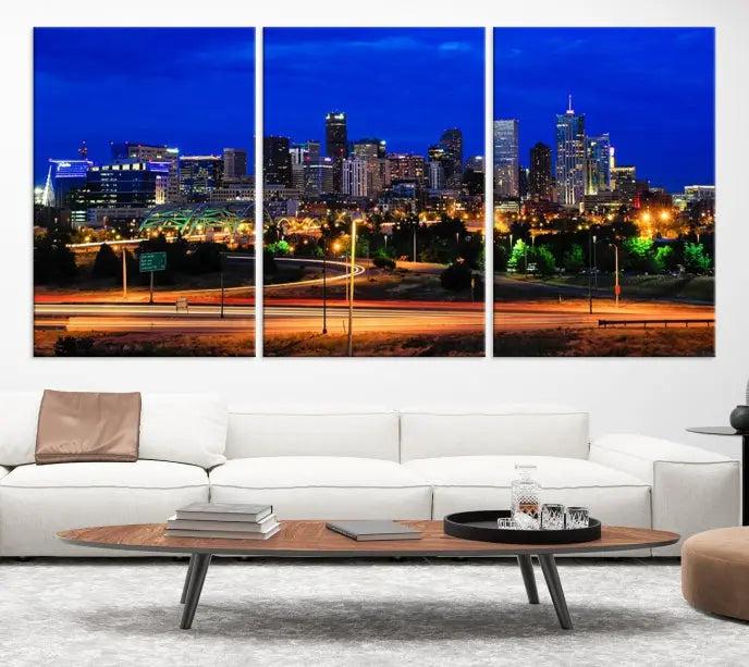 Display the exquisite Denver City Lights Night Bright Blue Skyline Cityscape View Wall Art Canvas Print. This museum-quality triptych canvas, delivered ready to hang with free shipping, effortlessly transforms your space.