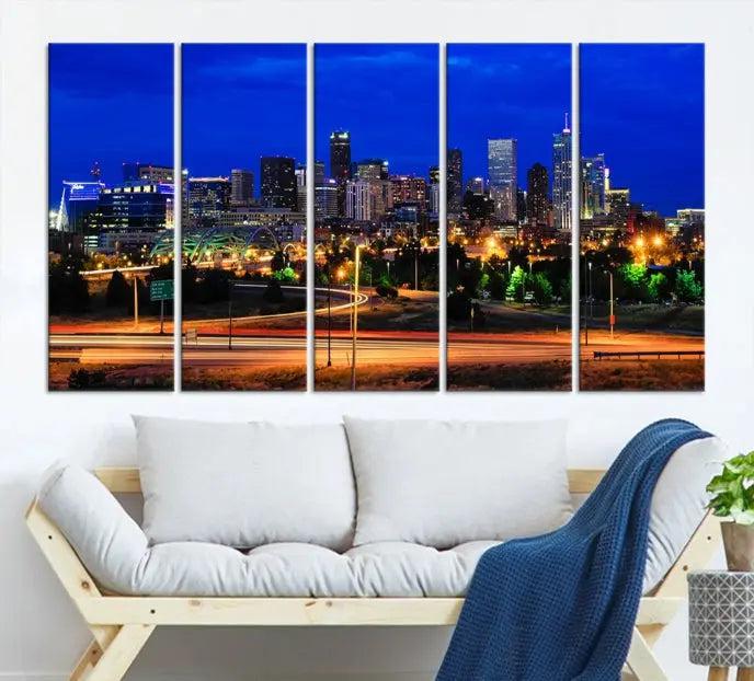 Display the exquisite Denver City Lights Night Bright Blue Skyline Cityscape View Wall Art Canvas Print. This museum-quality triptych canvas, delivered ready to hang with free shipping, effortlessly transforms your space.