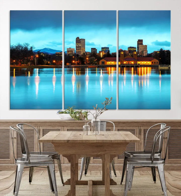 A living room in teal and brown decor showcases the "Denver City Lights Night Bright Turquoise Skyline Cityscape View" wall art canvas print above the couch. This large, museum-quality piece comes with a UV-protective coating.