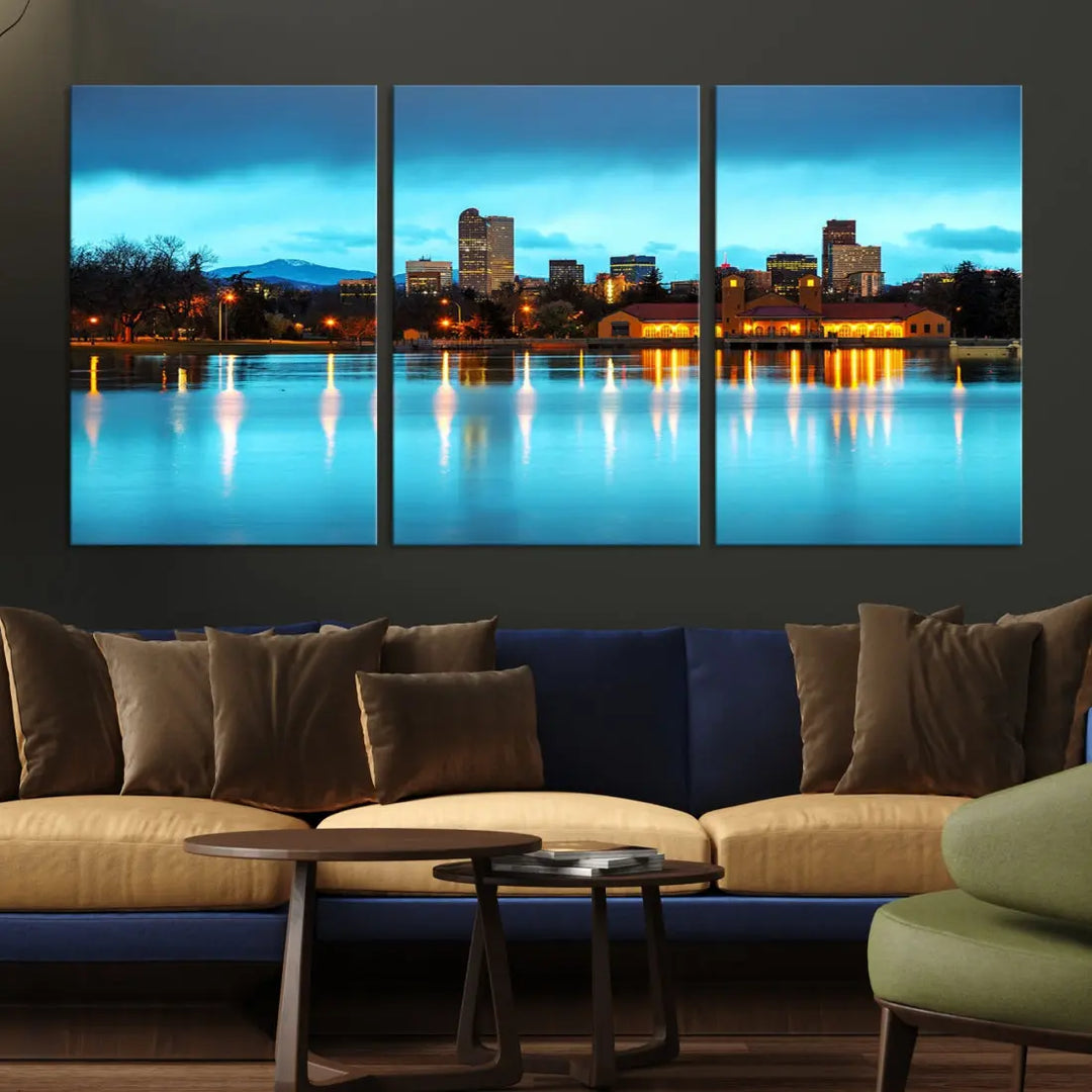 A living room in teal and brown decor showcases the "Denver City Lights Night Bright Turquoise Skyline Cityscape View" wall art canvas print above the couch. This large, museum-quality piece comes with a UV-protective coating.