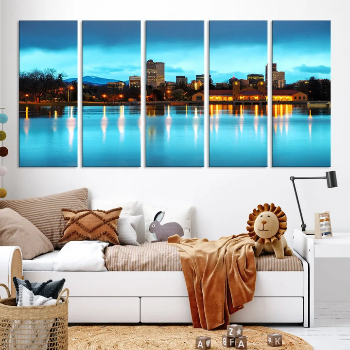 A living room in teal and brown decor showcases the "Denver City Lights Night Bright Turquoise Skyline Cityscape View" wall art canvas print above the couch. This large, museum-quality piece comes with a UV-protective coating.