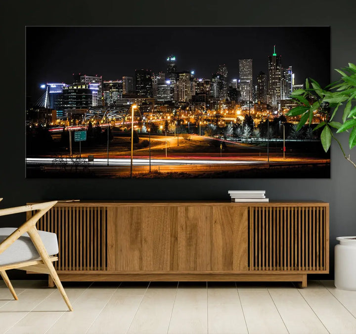 The Denver City Lights Night Skyline Cityscape View Wall Art Canvas Print is elegantly displayed on museum-quality canvas with a UV-protective coating.