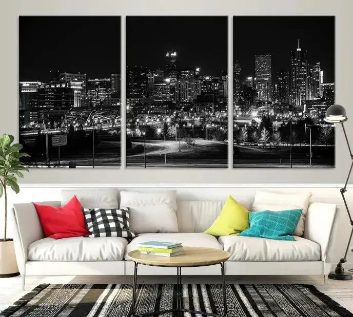 The Denver City Lights Skyline Black and White Wall Art Cityscape Canvas Print, a stunning three-panel piece, enhances the modern living room. Printed on museum-quality canvas and finished with a satin varnish, this artwork elegantly adds both charm and durability to the space.