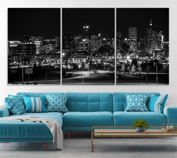 The Denver City Lights Skyline Black and White Wall Art Cityscape Canvas Print, a stunning three-panel piece, enhances the modern living room. Printed on museum-quality canvas and finished with a satin varnish, this artwork elegantly adds both charm and durability to the space.