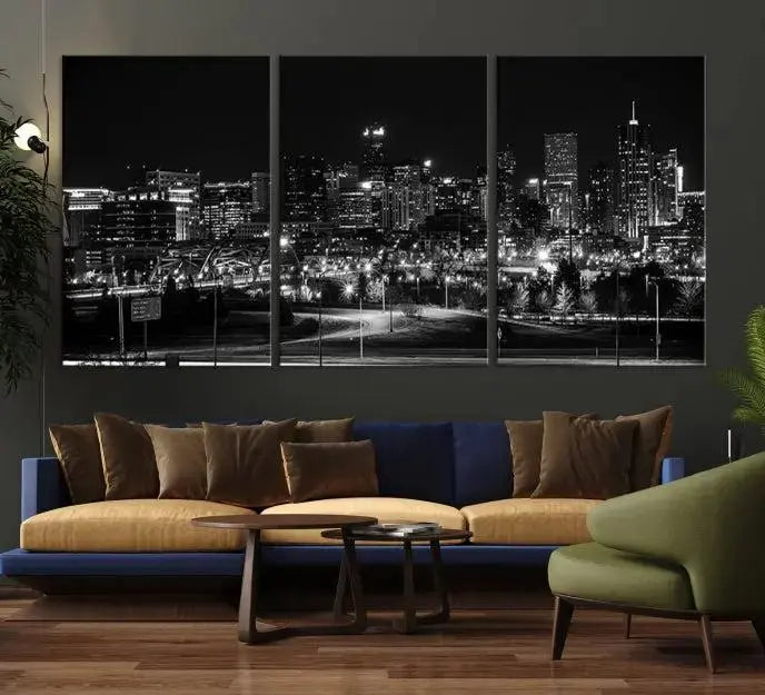 The Denver City Lights Skyline Black and White Wall Art Cityscape Canvas Print, a stunning three-panel piece, enhances the modern living room. Printed on museum-quality canvas and finished with a satin varnish, this artwork elegantly adds both charm and durability to the space.