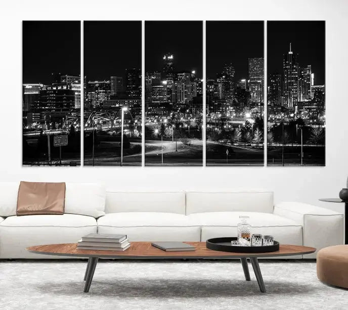 The Denver City Lights Skyline Black and White Wall Art Cityscape Canvas Print, a stunning three-panel piece, enhances the modern living room. Printed on museum-quality canvas and finished with a satin varnish, this artwork elegantly adds both charm and durability to the space.