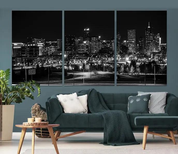 The Denver City Lights Skyline Black and White Wall Art Cityscape Canvas Print, a stunning three-panel piece, enhances the modern living room. Printed on museum-quality canvas and finished with a satin varnish, this artwork elegantly adds both charm and durability to the space.