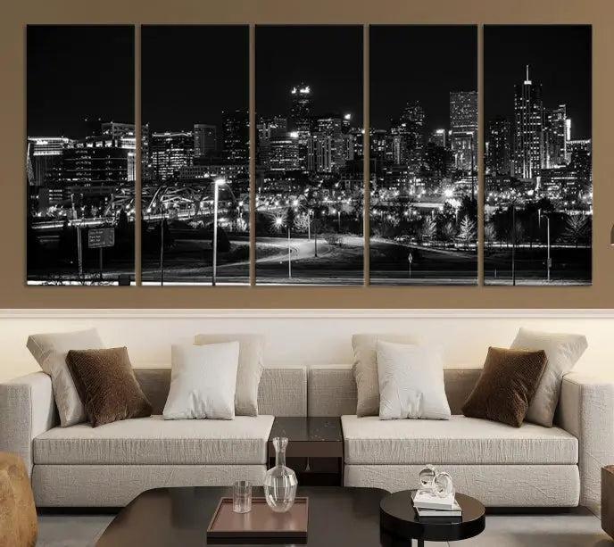 The Denver City Lights Skyline Black and White Wall Art Cityscape Canvas Print, a stunning three-panel piece, enhances the modern living room. Printed on museum-quality canvas and finished with a satin varnish, this artwork elegantly adds both charm and durability to the space.