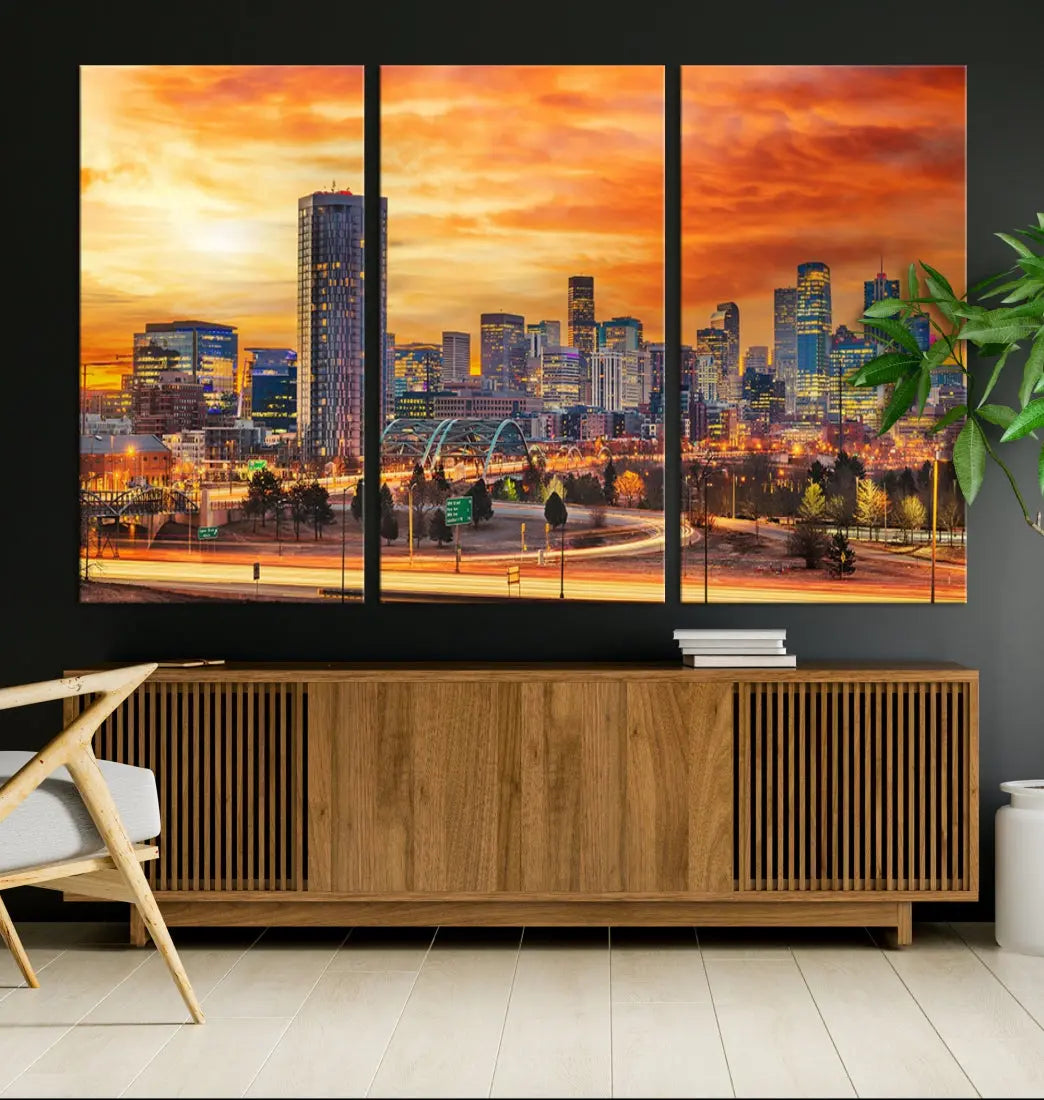 The "Denver City Lights Sunset Orange Cloudy Skyline Cityscape View Wall Art Canvas Print" features a vivid cityscape at sunset, beautifully presented on museum-quality canvases.