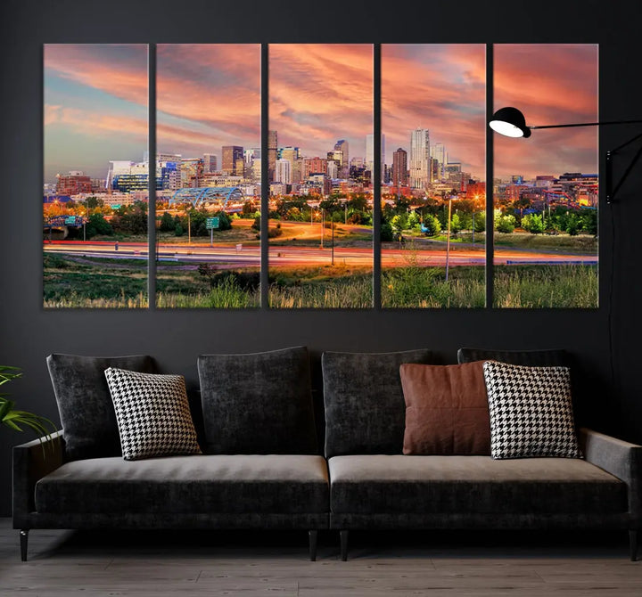 The modern living room showcases the "Denver City Lights Sunset Orange Cloudy Skyline Cityscape View Wall Art Canvas Print," a triptych of museum-quality canvases depicting a city skyline at sunset. This ready-to-hang artwork boasts a UV-protective coating to ensure lasting vibrancy.