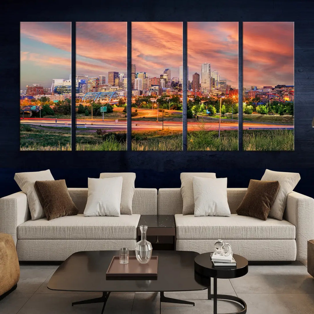 The modern living room showcases the "Denver City Lights Sunset Orange Cloudy Skyline Cityscape View Wall Art Canvas Print," a triptych of museum-quality canvases depicting a city skyline at sunset. This ready-to-hang artwork boasts a UV-protective coating to ensure lasting vibrancy.