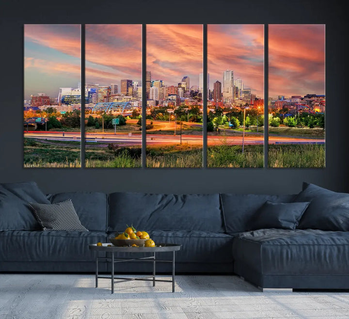 The modern living room showcases the "Denver City Lights Sunset Orange Cloudy Skyline Cityscape View Wall Art Canvas Print," a triptych of museum-quality canvases depicting a city skyline at sunset. This ready-to-hang artwork boasts a UV-protective coating to ensure lasting vibrancy.