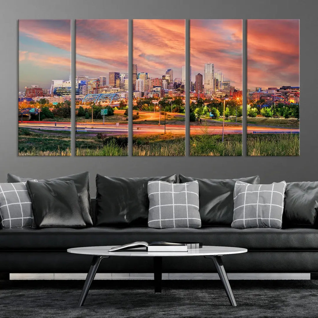 The modern living room showcases the "Denver City Lights Sunset Orange Cloudy Skyline Cityscape View Wall Art Canvas Print," a triptych of museum-quality canvases depicting a city skyline at sunset. This ready-to-hang artwork boasts a UV-protective coating to ensure lasting vibrancy.