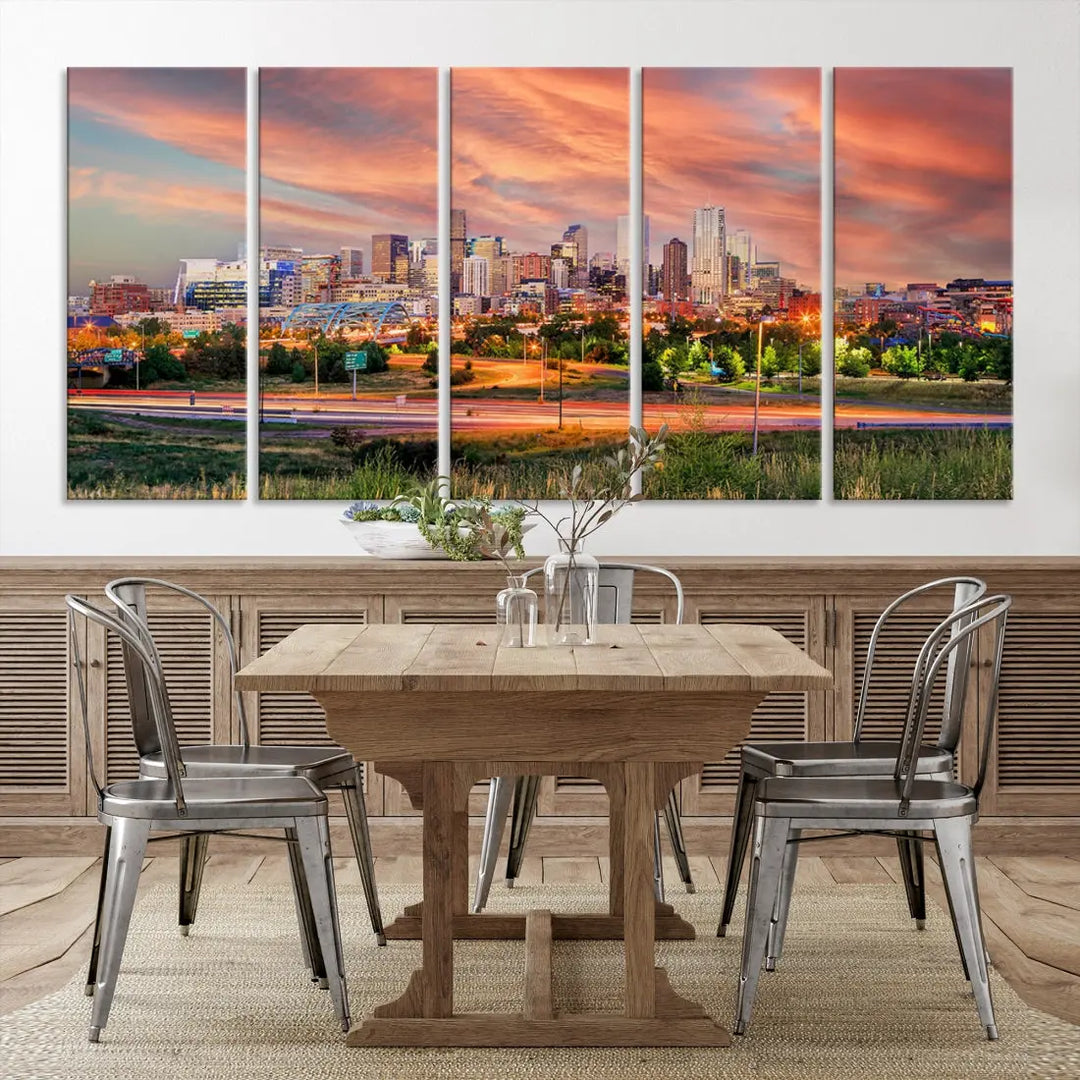 The modern living room showcases the "Denver City Lights Sunset Orange Cloudy Skyline Cityscape View Wall Art Canvas Print," a triptych of museum-quality canvases depicting a city skyline at sunset. This ready-to-hang artwork boasts a UV-protective coating to ensure lasting vibrancy.