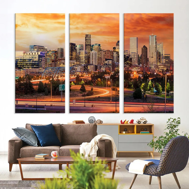 The Denver City Lights Sunset Orange Skyline Cityscape View Wall Art Canvas Print features a vibrant city skyline at sunset with orange and yellow skies. Crafted on museum-quality canvas with a UV-protective coating, it showcases the artistry of a professional craftsman.