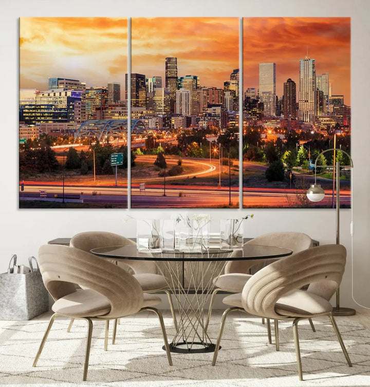 The Denver City Lights Sunset Orange Skyline Cityscape View Wall Art Canvas Print features a vibrant city skyline at sunset with orange and yellow skies. Crafted on museum-quality canvas with a UV-protective coating, it showcases the artistry of a professional craftsman.