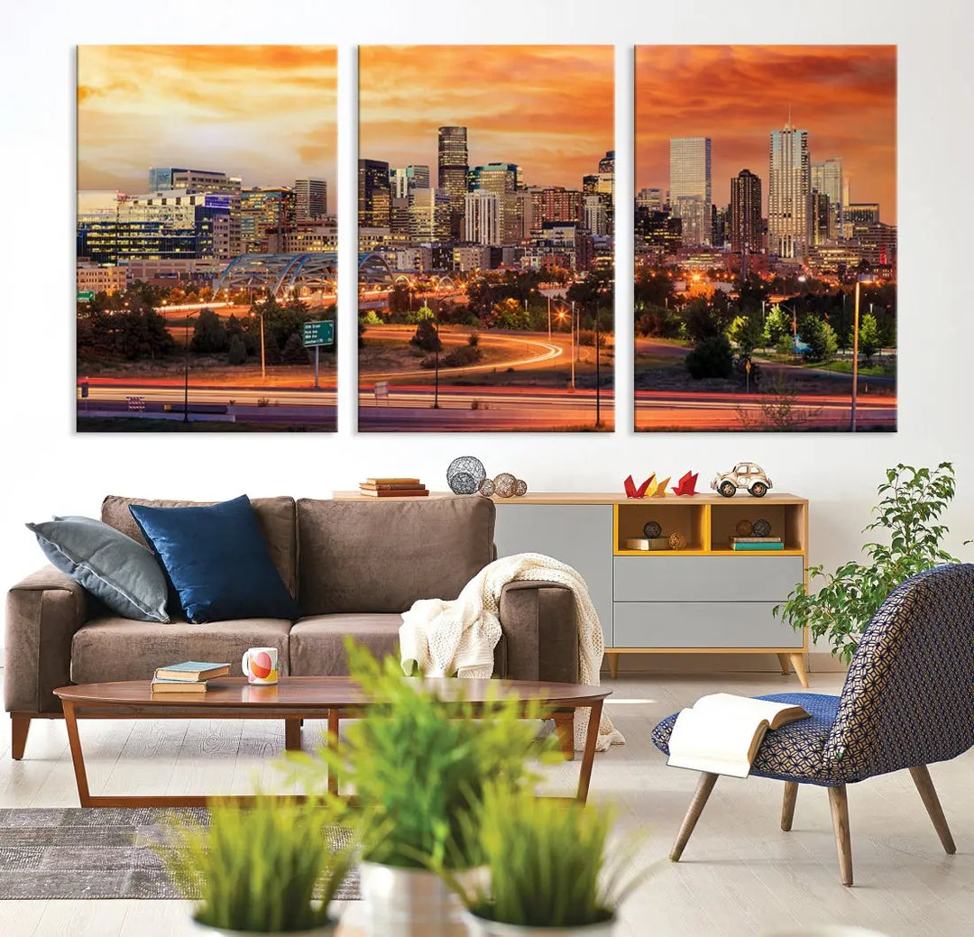 The Denver City Lights Sunset Orange Skyline Cityscape View Wall Art Canvas Print features a vibrant city skyline at sunset with orange and yellow skies. Crafted on museum-quality canvas with a UV-protective coating, it showcases the artistry of a professional craftsman.