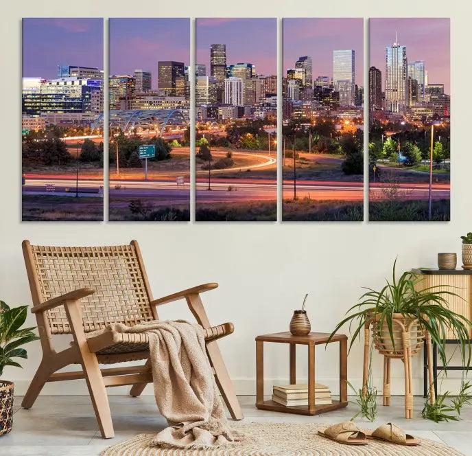 The cozy living room is adorned with a triptych of the "Denver City Lights Sunset Purple Skyline Cityscape View Wall Art Canvas Print." Professionally hand-assembled, these museum-quality canvases bring elegance and sophistication to the space, complemented by the convenience of free shipping.