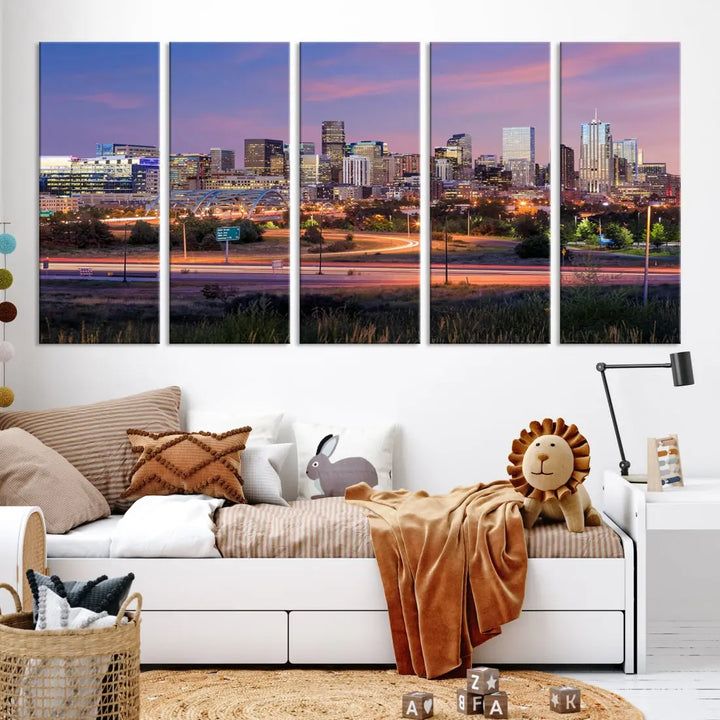 The Denver City Lights Sunset Purple Skyline Cityscape View Wall Art Canvas Print is crafted on museum-quality canvas with a UV-protective coating. It is displayed on a wall.