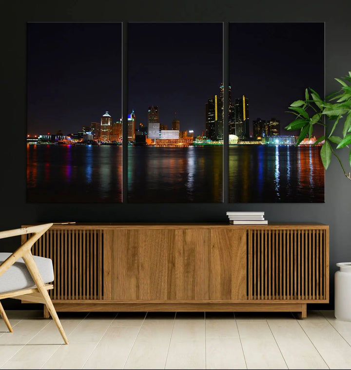 A large Detroit City Lights Night Skyline Cityscape View Wall Art Canvas Print hangs on the wall, elegantly gallery-wrapped.