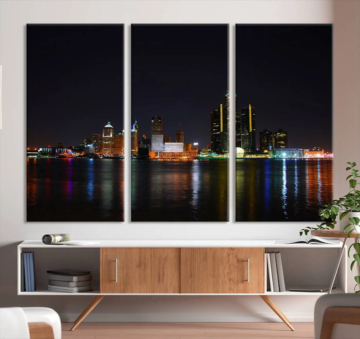 A large Detroit City Lights Night Skyline Cityscape View Wall Art Canvas Print hangs on the wall, elegantly gallery-wrapped.