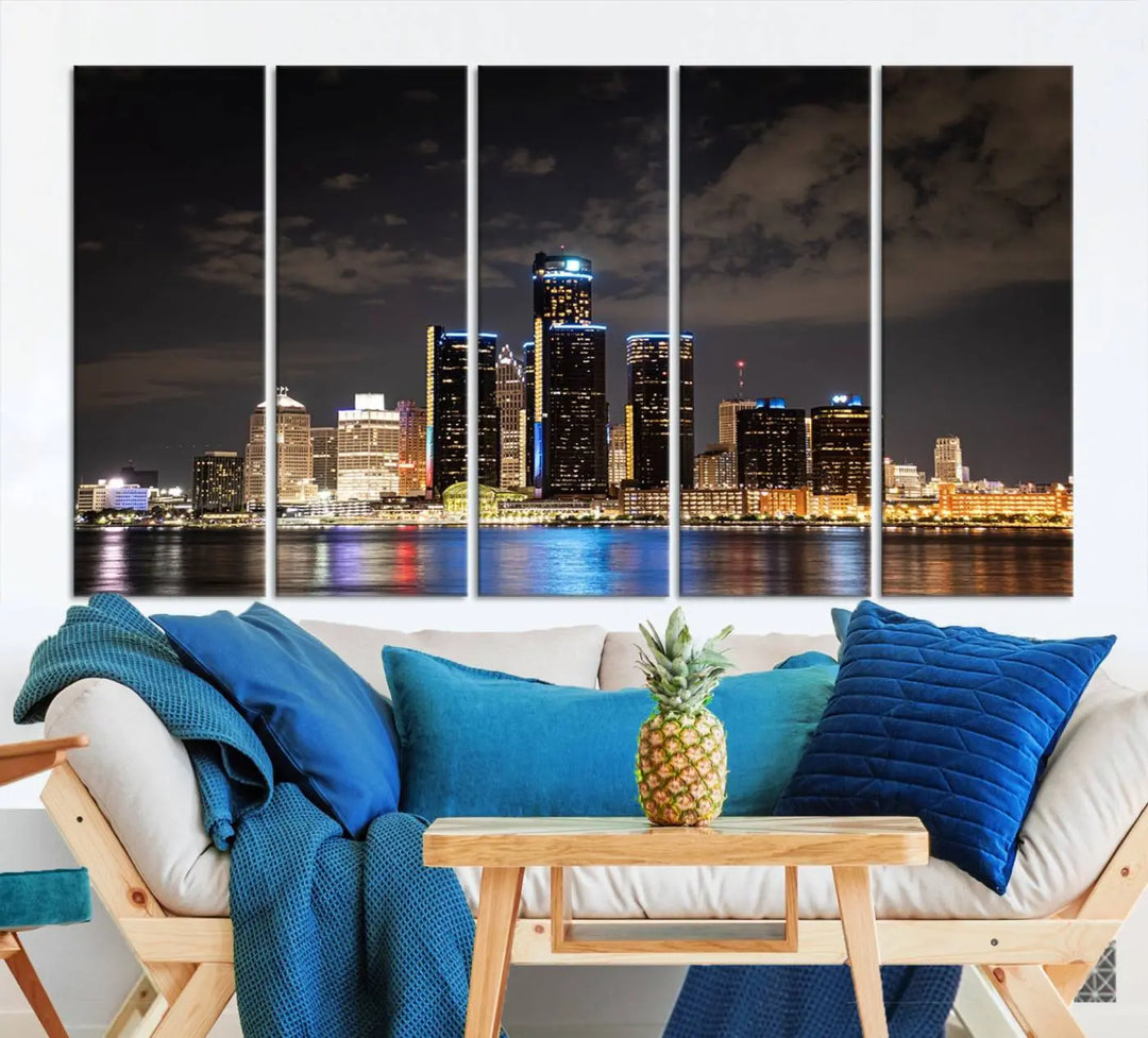 The "Detroit City Lights Night Skyline Cityscape View" wall art on museum-quality canvas is the centerpiece of this living room. This artwork includes a UV-protective coating to ensure its vibrant appearance lasts for years.