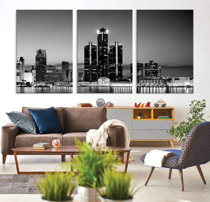 A modern living room showcases the Detroit City Lights Skyline Black and White Wall Art Cityscape Canvas Print on the wall, featuring museum-quality canvases crafted by professional artisans.