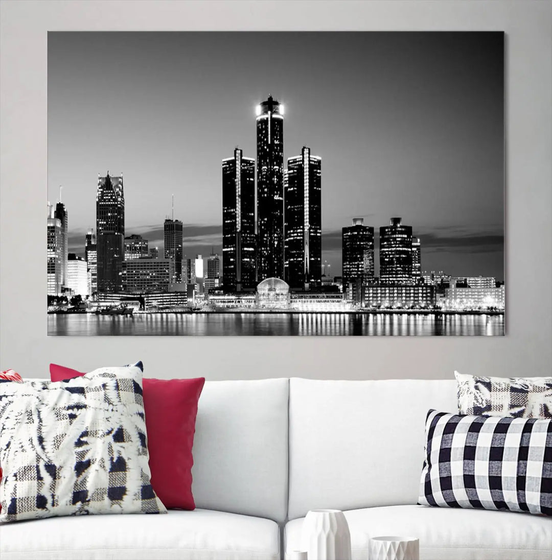 A modern living room showcases the Detroit City Lights Skyline Black and White Wall Art Cityscape Canvas Print on the wall, featuring museum-quality canvases crafted by professional artisans.