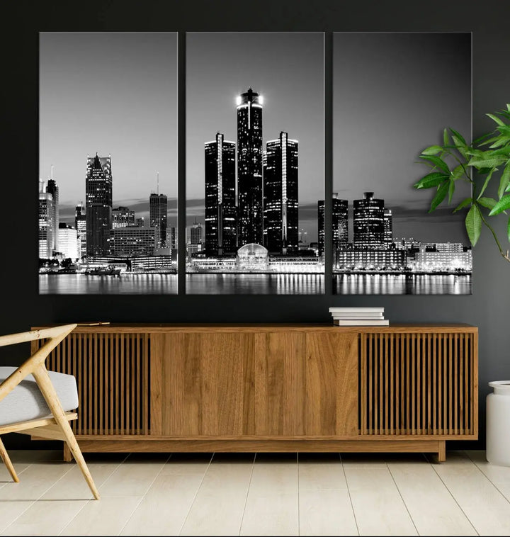 A modern living room showcases the Detroit City Lights Skyline Black and White Wall Art Cityscape Canvas Print on the wall, featuring museum-quality canvases crafted by professional artisans.