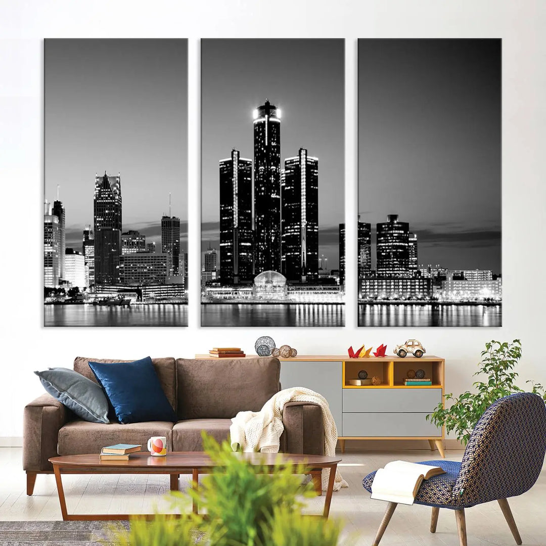 A modern living room showcases the Detroit City Lights Skyline Black and White Wall Art Cityscape Canvas Print on the wall, featuring museum-quality canvases crafted by professional artisans.