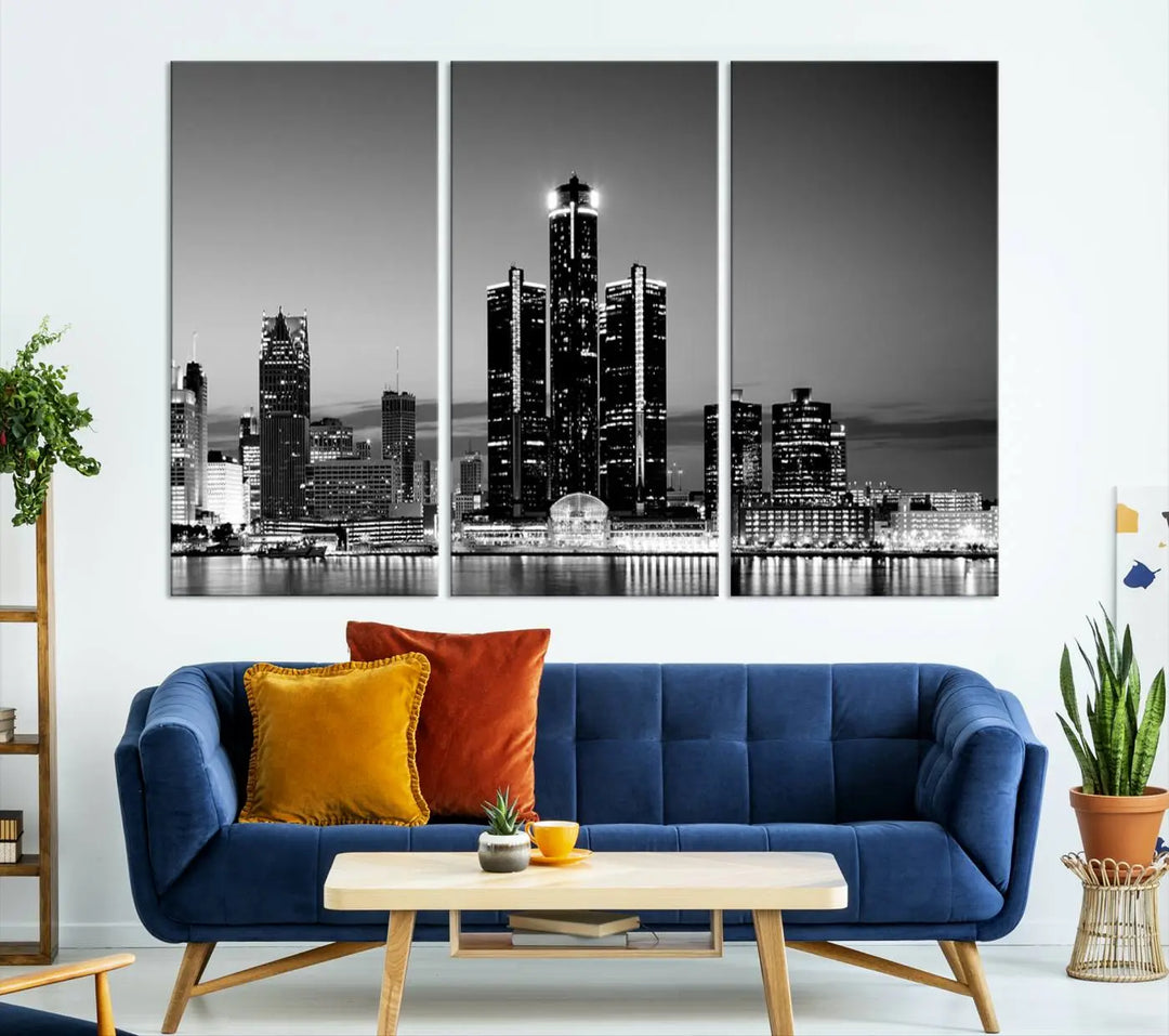 A modern living room showcases the Detroit City Lights Skyline Black and White Wall Art Cityscape Canvas Print on the wall, featuring museum-quality canvases crafted by professional artisans.