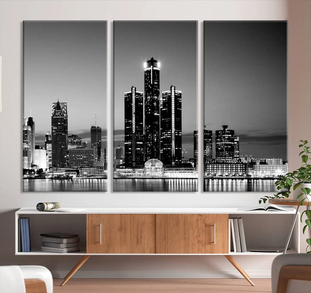 A modern living room showcases the Detroit City Lights Skyline Black and White Wall Art Cityscape Canvas Print on the wall, featuring museum-quality canvases crafted by professional artisans.