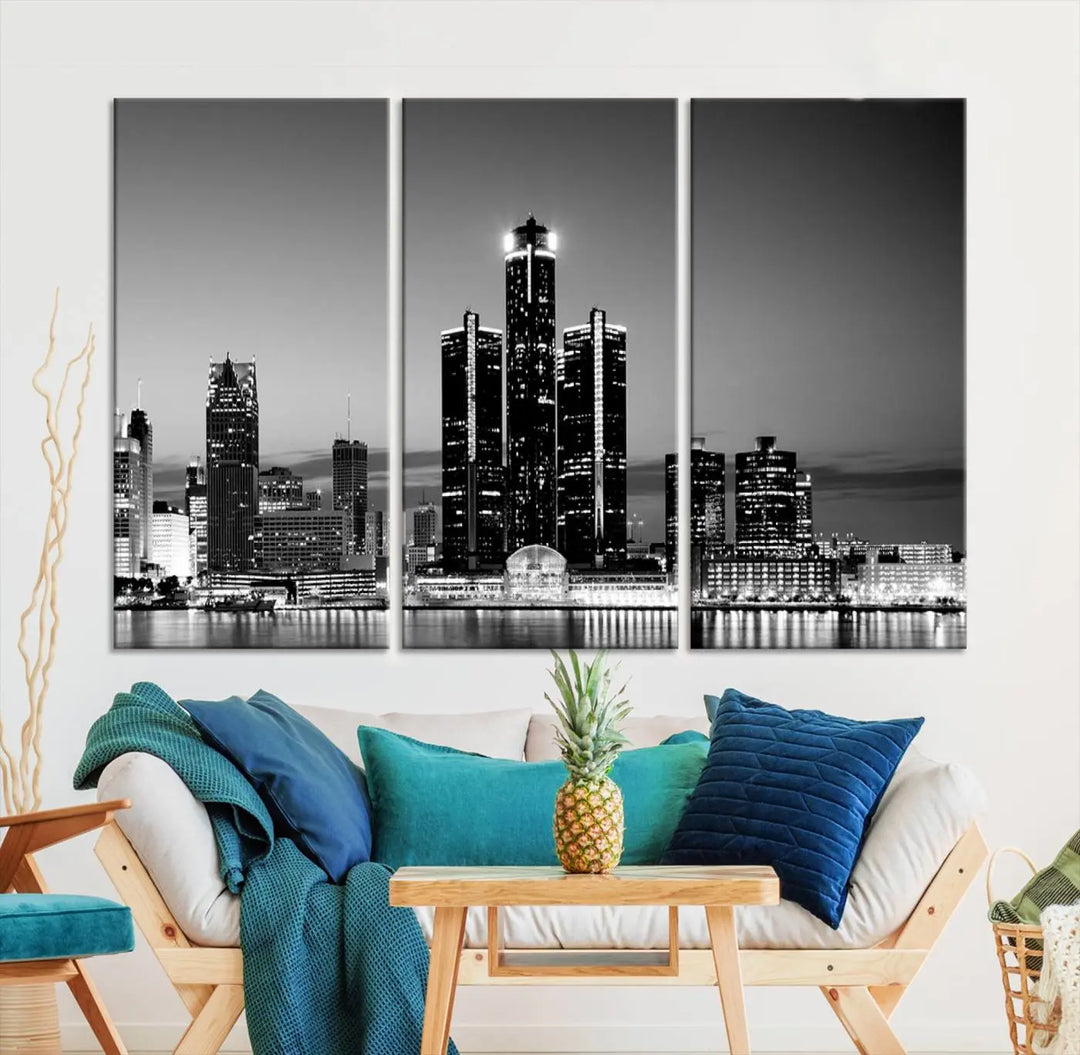 A modern living room showcases the Detroit City Lights Skyline Black and White Wall Art Cityscape Canvas Print on the wall, featuring museum-quality canvases crafted by professional artisans.