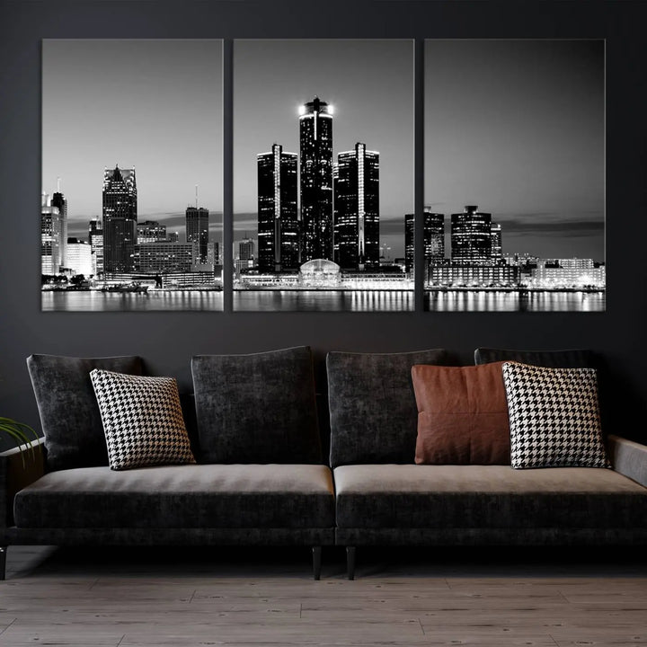 A modern living room showcases the Detroit City Lights Skyline Black and White Wall Art Cityscape Canvas Print on the wall, featuring museum-quality canvases crafted by professional artisans.