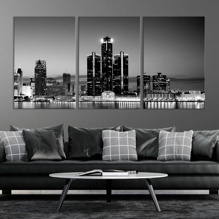 A modern living room showcases the Detroit City Lights Skyline Black and White Wall Art Cityscape Canvas Print on the wall, featuring museum-quality canvases crafted by professional artisans.