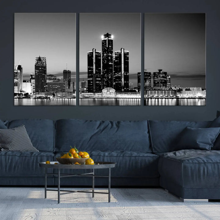 A modern living room showcases the Detroit City Lights Skyline Black and White Wall Art Cityscape Canvas Print on the wall, featuring museum-quality canvases crafted by professional artisans.