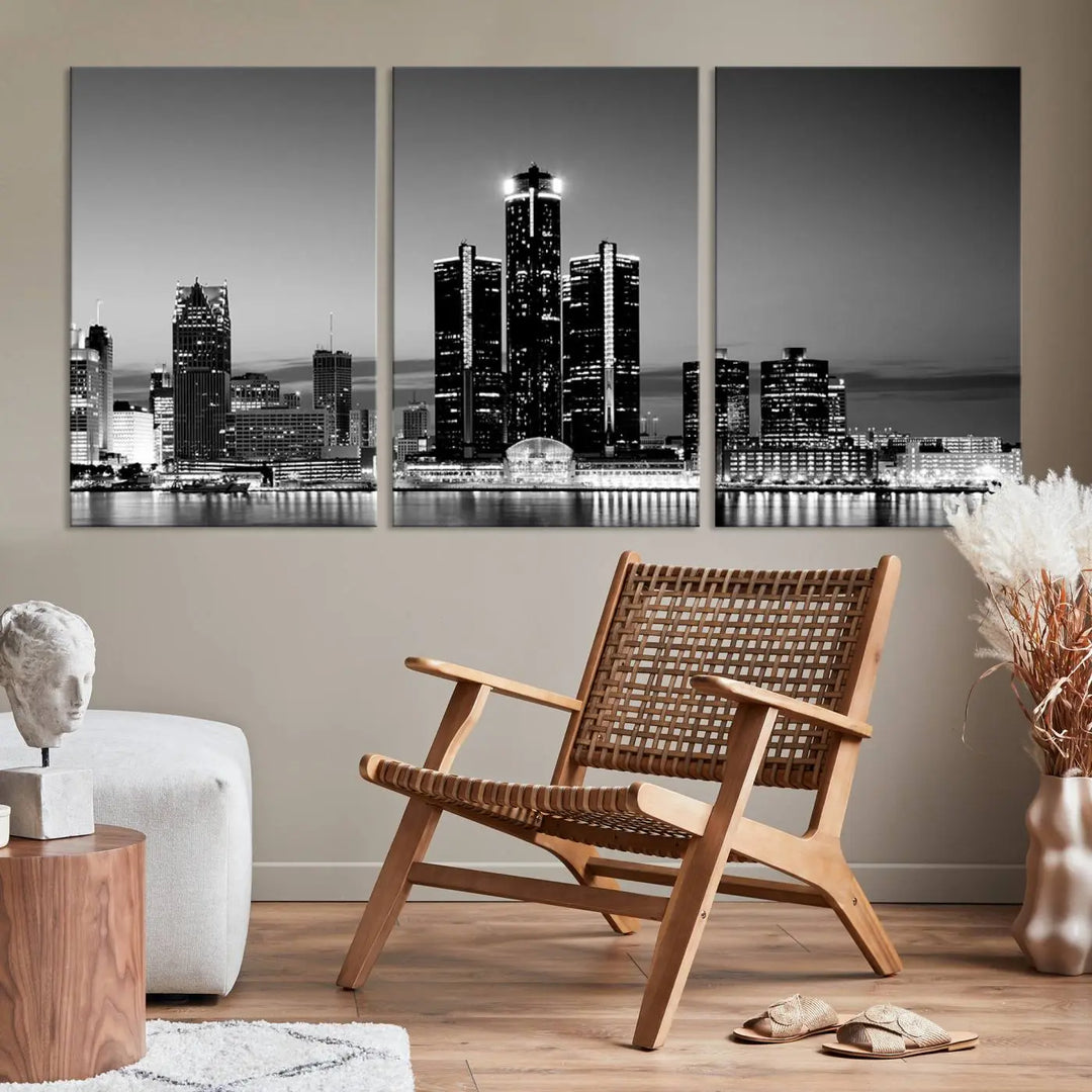 A modern living room showcases the Detroit City Lights Skyline Black and White Wall Art Cityscape Canvas Print on the wall, featuring museum-quality canvases crafted by professional artisans.