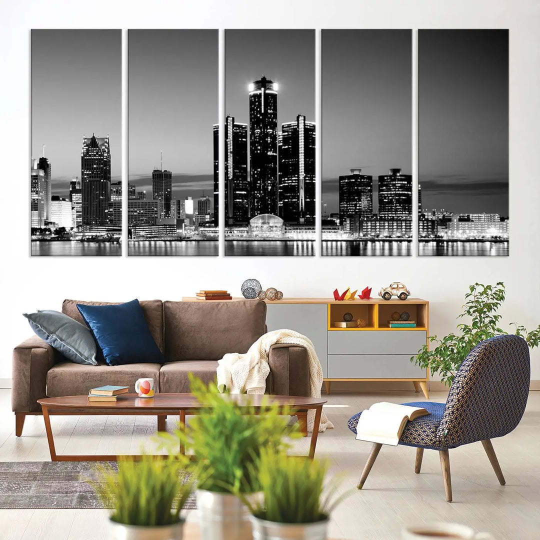 A modern living room showcases the Detroit City Lights Skyline Black and White Wall Art Cityscape Canvas Print on the wall, featuring museum-quality canvases crafted by professional artisans.