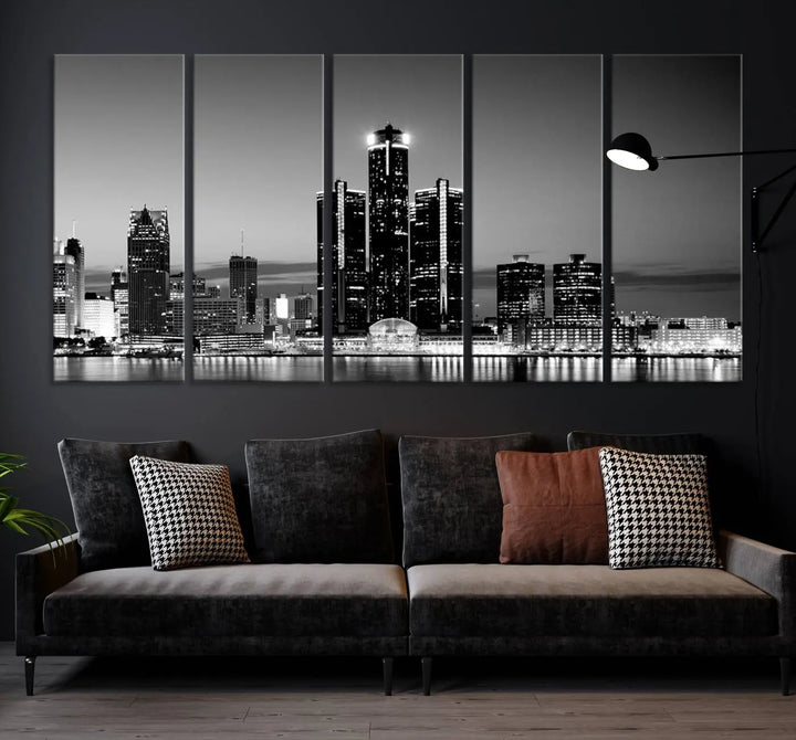 A modern living room showcases the Detroit City Lights Skyline Black and White Wall Art Cityscape Canvas Print on the wall, featuring museum-quality canvases crafted by professional artisans.