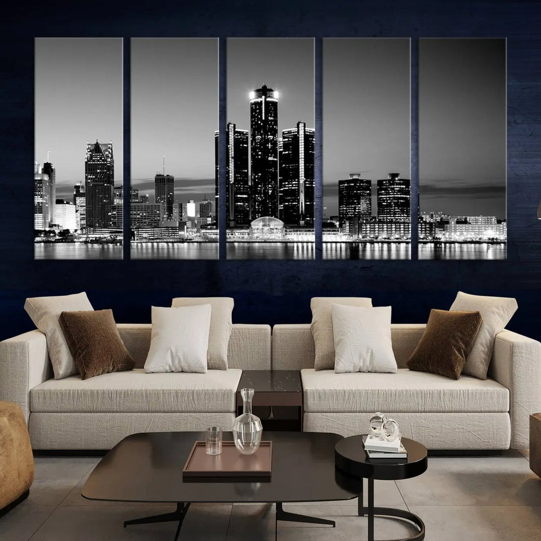 A modern living room showcases the Detroit City Lights Skyline Black and White Wall Art Cityscape Canvas Print on the wall, featuring museum-quality canvases crafted by professional artisans.