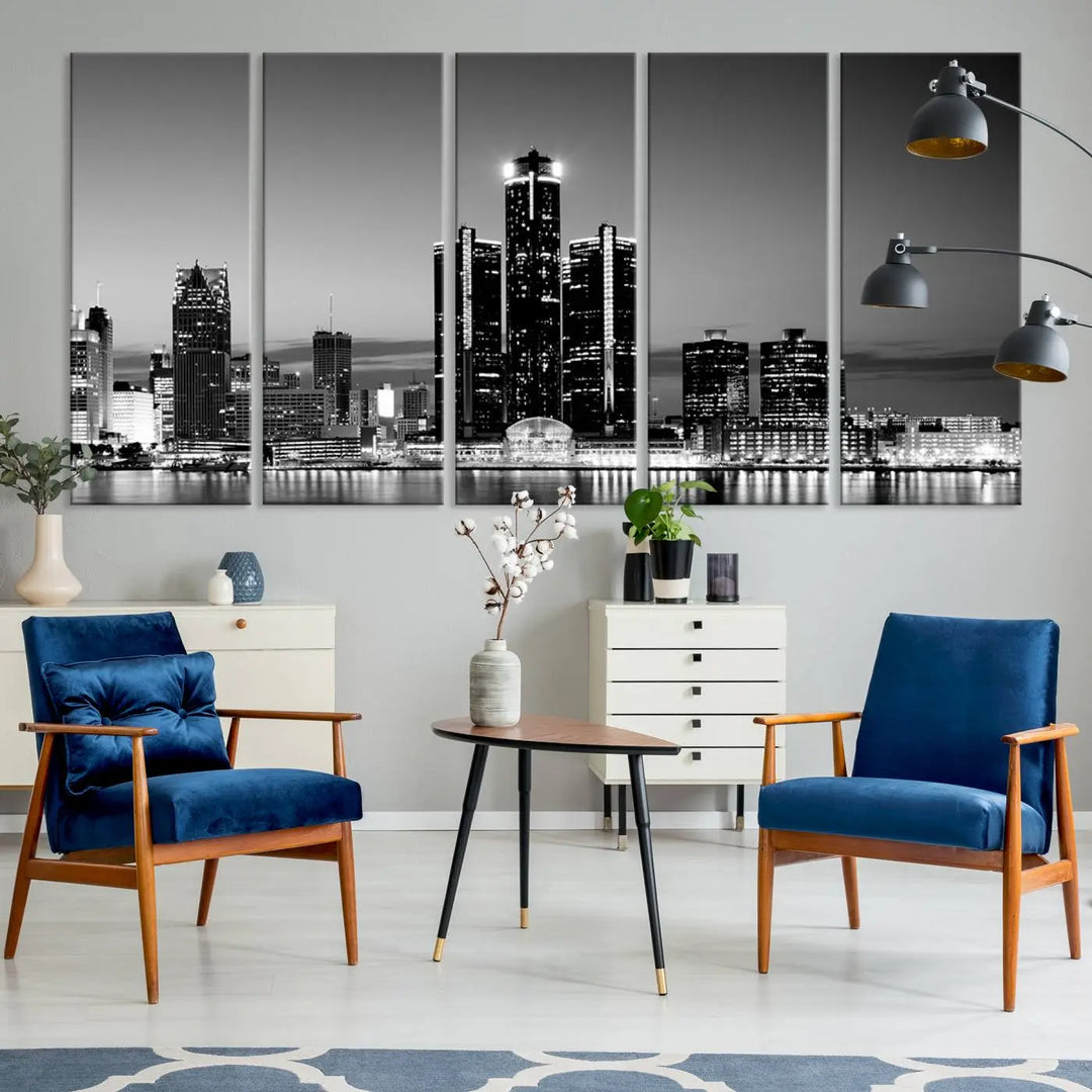 A modern living room showcases the Detroit City Lights Skyline Black and White Wall Art Cityscape Canvas Print on the wall, featuring museum-quality canvases crafted by professional artisans.