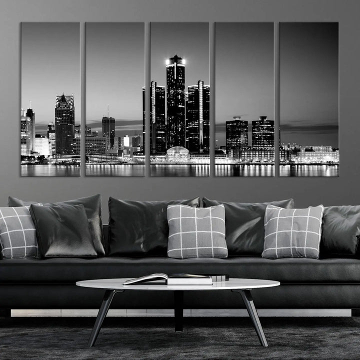 A modern living room showcases the Detroit City Lights Skyline Black and White Wall Art Cityscape Canvas Print on the wall, featuring museum-quality canvases crafted by professional artisans.