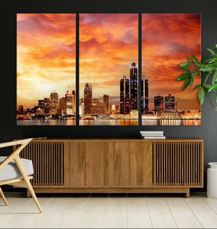 The "Detroit City Lights Sunset Orange Cloudy Skyline Cityscape View Wall Art Canvas Print" presents a stunning city skyline at sunset, divided into three panels. It features warm orange and pink clouds on museum-quality canvas and includes a UV-protective coating for enhanced durability and vibrant colors.