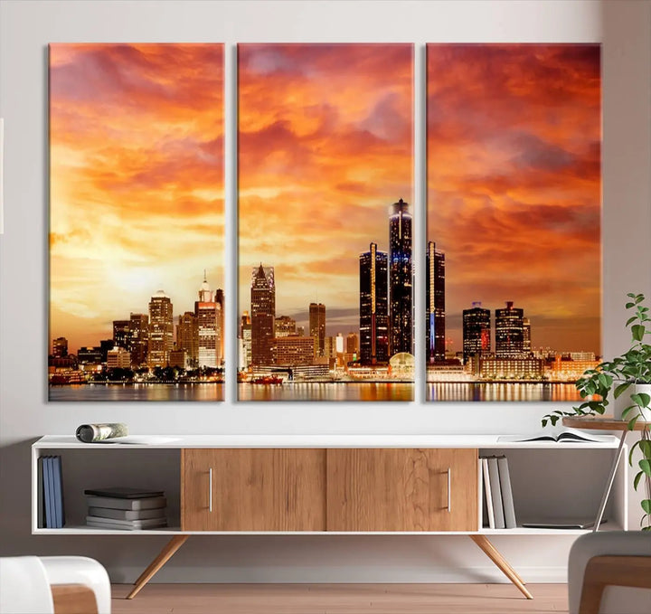 The "Detroit City Lights Sunset Orange Cloudy Skyline Cityscape View Wall Art Canvas Print" presents a stunning city skyline at sunset, divided into three panels. It features warm orange and pink clouds on museum-quality canvas and includes a UV-protective coating for enhanced durability and vibrant colors.