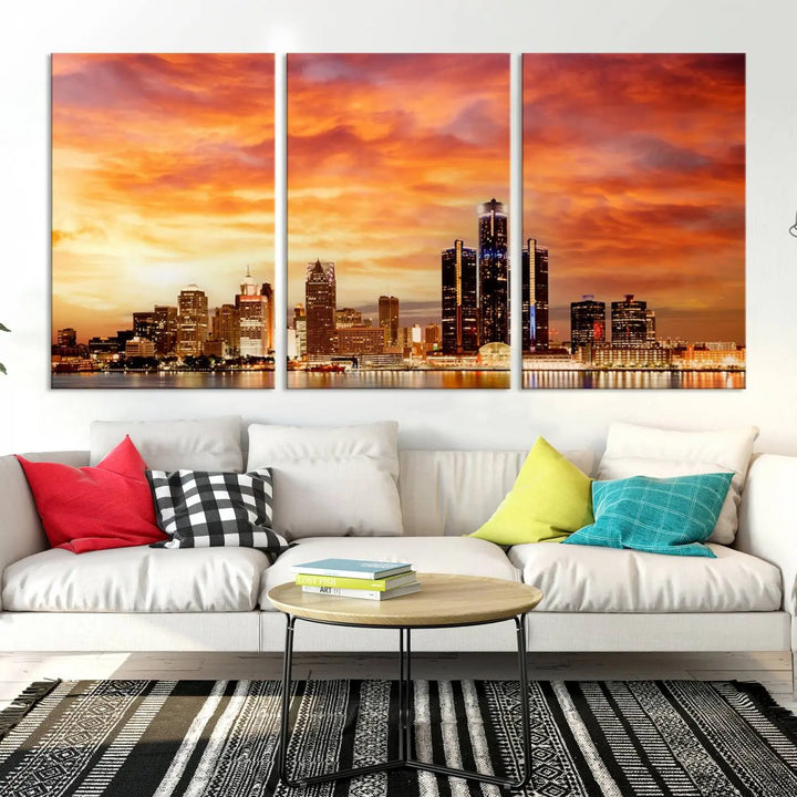 The "Detroit City Lights Sunset Orange Cloudy Skyline Cityscape View Wall Art Canvas Print" presents a stunning city skyline at sunset, divided into three panels. It features warm orange and pink clouds on museum-quality canvas and includes a UV-protective coating for enhanced durability and vibrant colors.