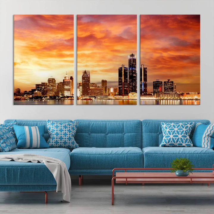 The "Detroit City Lights Sunset Orange Cloudy Skyline Cityscape View Wall Art Canvas Print" presents a stunning city skyline at sunset, divided into three panels. It features warm orange and pink clouds on museum-quality canvas and includes a UV-protective coating for enhanced durability and vibrant colors.