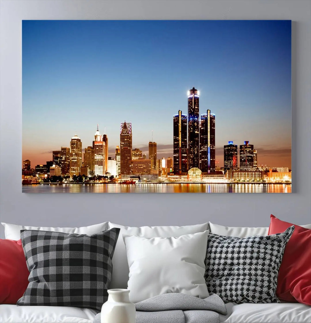 The Detroit City Lights Sunset Skyline Cityscape View Wall Art Canvas Print is displayed as a triptych. This artwork is printed on museum-quality canvas with a UV-protective coating and includes free shipping.