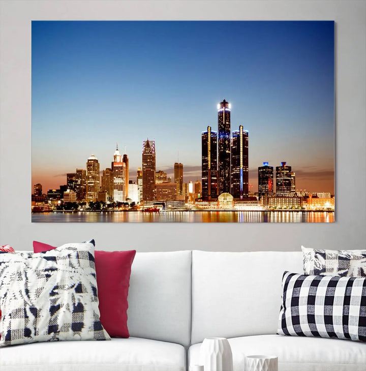 The Detroit City Lights Sunset Skyline Cityscape View Wall Art Canvas Print is displayed as a triptych. This artwork is printed on museum-quality canvas with a UV-protective coating and includes free shipping.